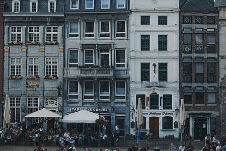 people near building during daytime thumbnail