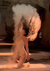 photography of woman in one-piece suit flipping hair with dust thumbnail