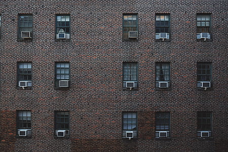 brown concrete building wall thumbnail