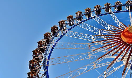 macro shot photography of ferris wheel during daytime thumbnail