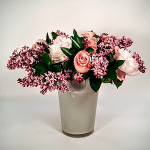 pink flowers inside plant pot thumbnail