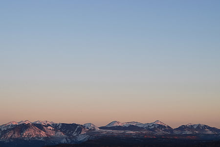 panoramic view of snow-capped mountain ranges thumbnail
