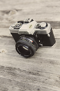 Minolta Camera on Wooden Surface thumbnail