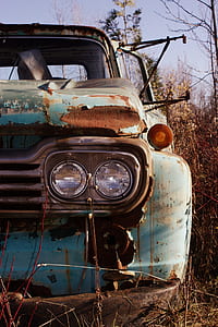 close-up photography of teal vehicle thumbnail