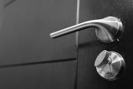 grayscale photo of door handle thumbnail