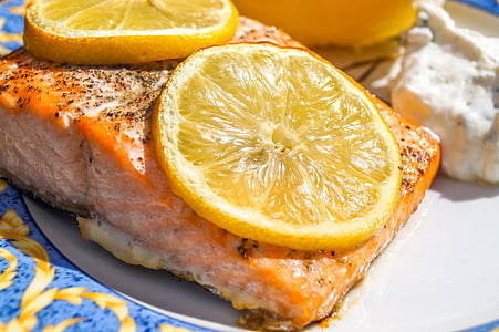 sliced lemon on fish dish thumbnail