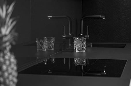 clear drinking glass on sink thumbnail
