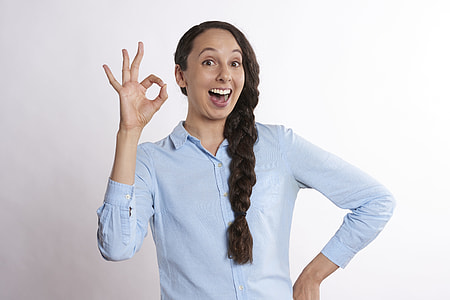 smiling woman wearing white dress shirt thumbnail