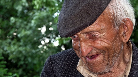 man wearing black beret thumbnail
