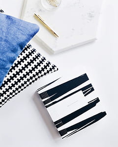 white and black labeled box on white wooden surface thumbnail