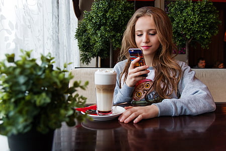 woman wearing gray sweater thumbnail