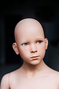 selective focus photography of mannequin thumbnail