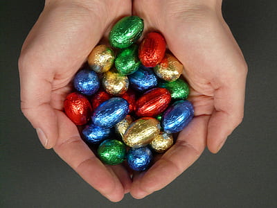 chocolates in person's palm thumbnail