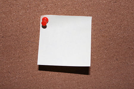 white paper with red cork pin thumbnail