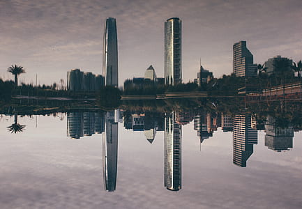 photography of three high-rise buildings thumbnail