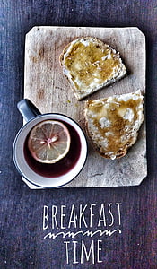bread and mug filled with red liquid on top of wood slab with breakfast time text overlay thumbnail