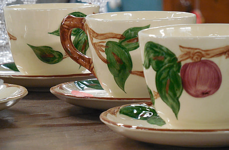 three white-green-and-red fruit themed ceramic teacups thumbnail