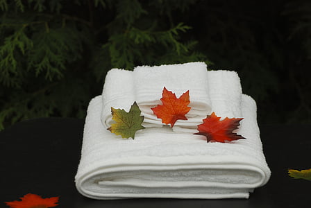 white towels with leaves thumbnail