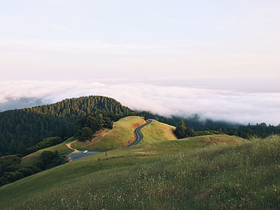 green grass mountain photo during daytime thumbnail