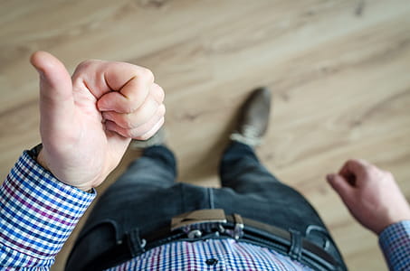 Person Showing His Left Thumb thumbnail