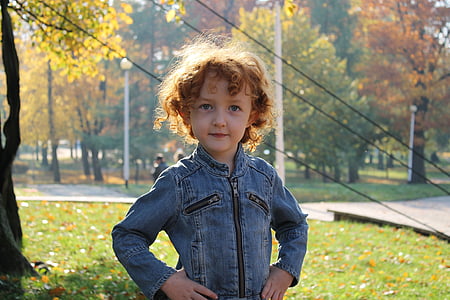 toddler standing near tree thumbnail