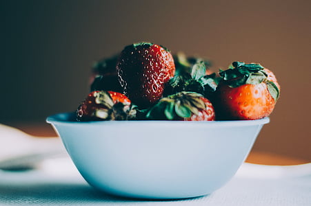 strawberry on white ceramic bowl thumbnail