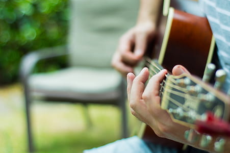 person playing guitar thumbnail