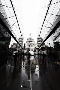 photo walking between glass walled buildings thumbnail