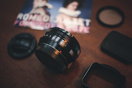 black telephoto lens on table thumbnail