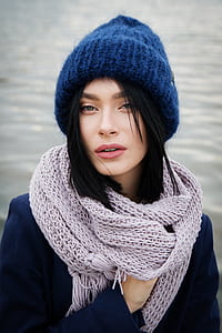 woman wearing blue knit hat thumbnail