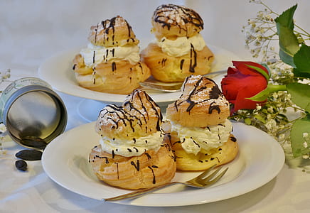 desserts served on white ceramic plate near red rose thumbnail