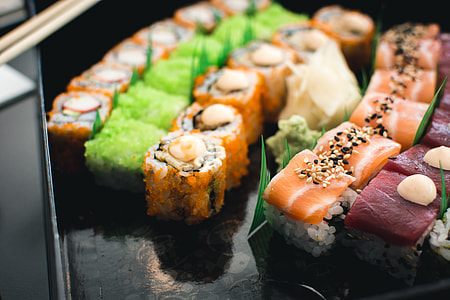 Colorful sushi in a black box thumbnail