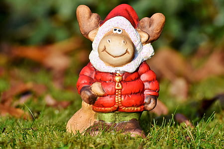 moose wearing coat toy on grass thumbnail