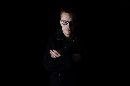 man in black eyeglasses and black top thumbnail