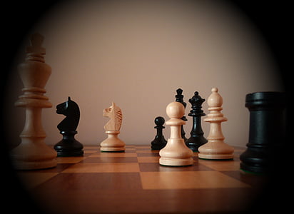 chess pieces on vignette photography thumbnail