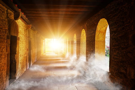light shining in brown concrete temple at daytime thumbnail