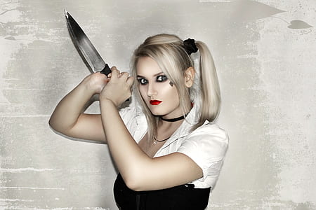 woman in Harley Quinn costume thumbnail