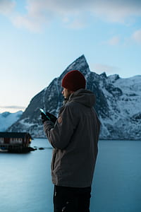 man using white smartphone outdoor thumbnail