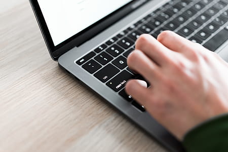 Freelance Man Typing on His Laptop Close Up thumbnail