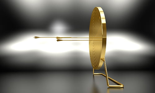 selective focus photography of round gold stand decor thumbnail
