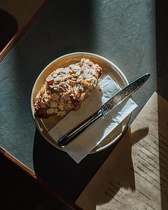 gray bread knife on plate thumbnail