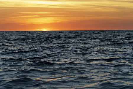 sea water under brown clouds thumbnail