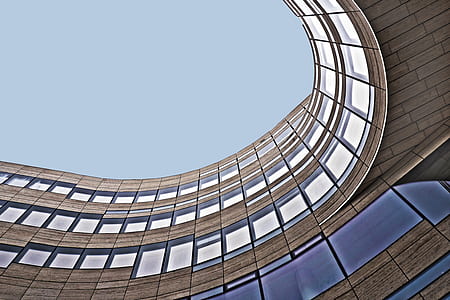 worms-eye view of brown building thumbnail