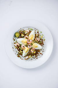 sliced eggs on white plate thumbnail