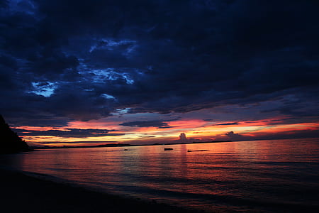 landscape photography of seashore under golden hour thumbnail