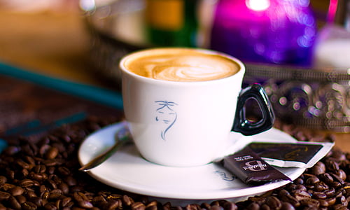white ceramic teacup with coffee thumbnail
