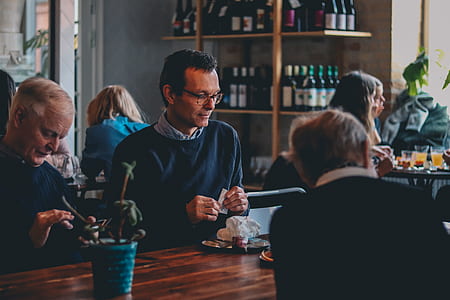 group of people eating indoors thumbnail