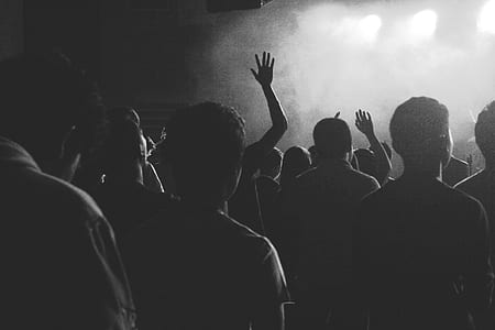 group of people standing near stage thumbnail