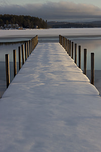 brown wooden bridge with snow thumbnail