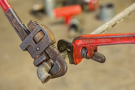 two brown and red RIDGID pipe wrenches thumbnail